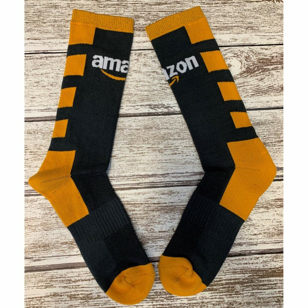 Tall athletic custom knitted yellow and black socks with Amazon logo