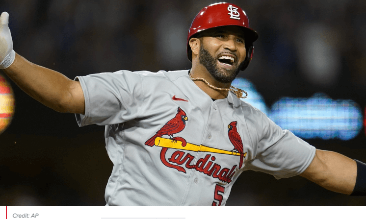 Baseball player man on game wearing Cardinals’ iconic bird and bat uniform