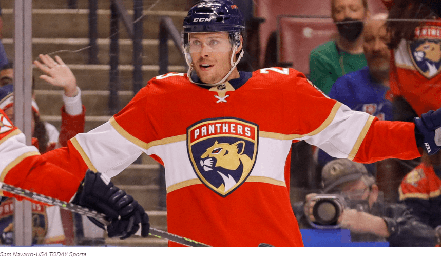 Hockey player on game wearing The National Hockey League’s Florida Panthers red and white combination