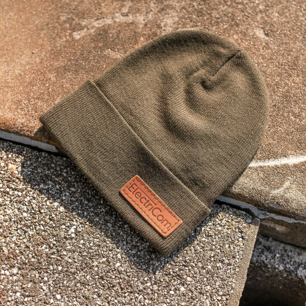 Army green beanie with embossed leather logo
